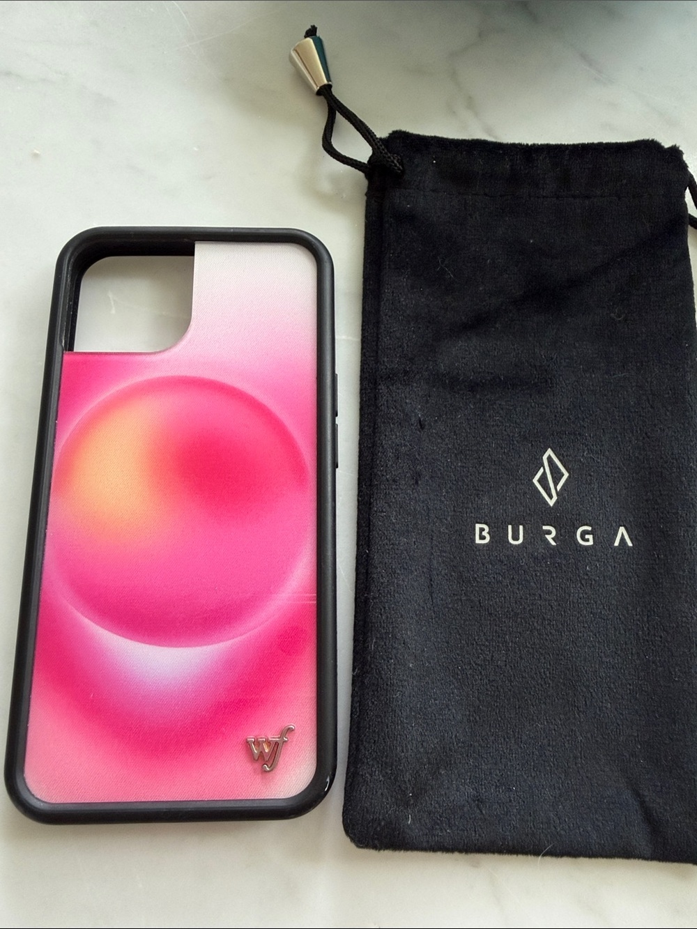 Pink iPhone 13 wildflower phone case with Burga dust jacket